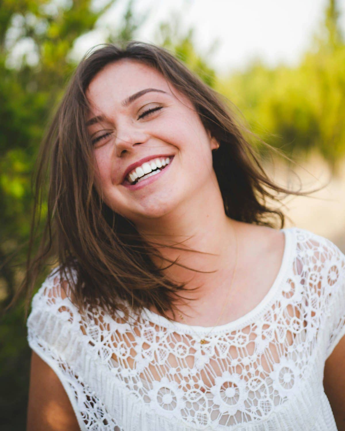 Smiling woman with white teeth